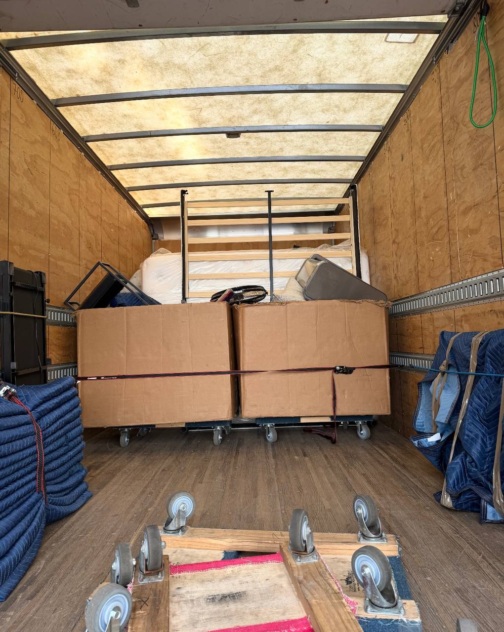 Securely loaded moving truck with furniture and boxes