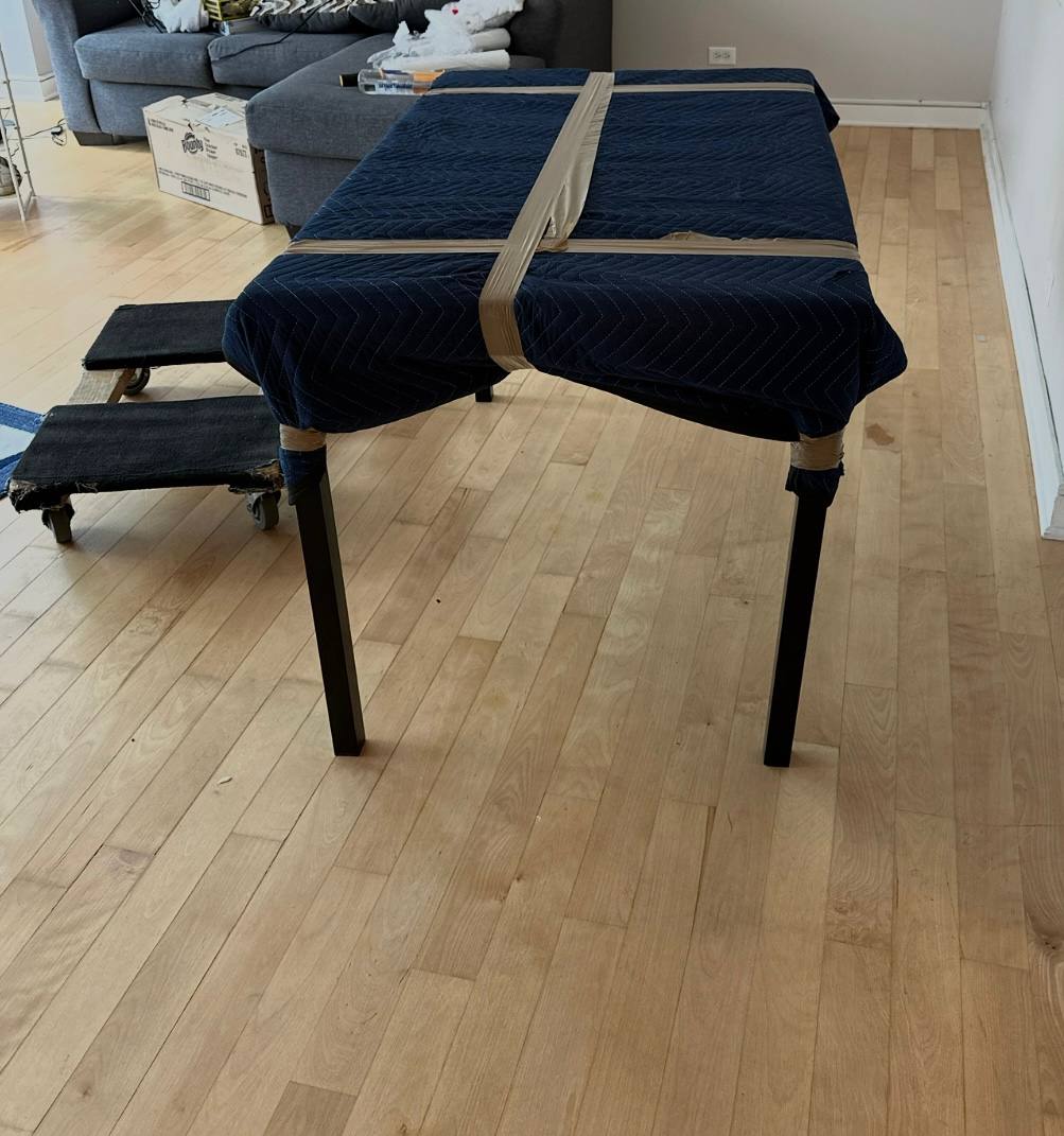 Professionally wrapped dining table for moving