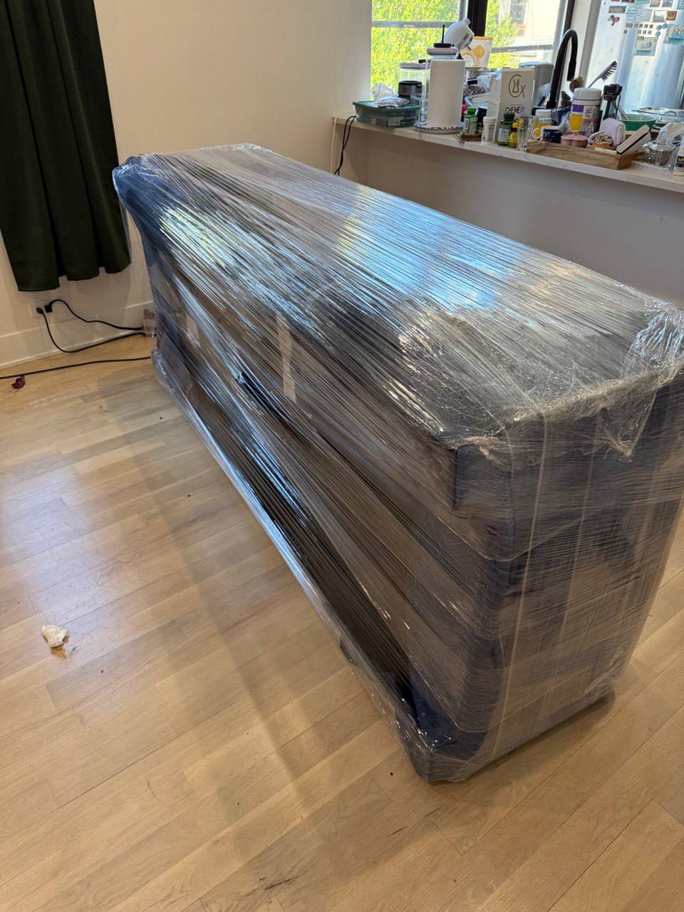 Professionally wrapped sofa for moving