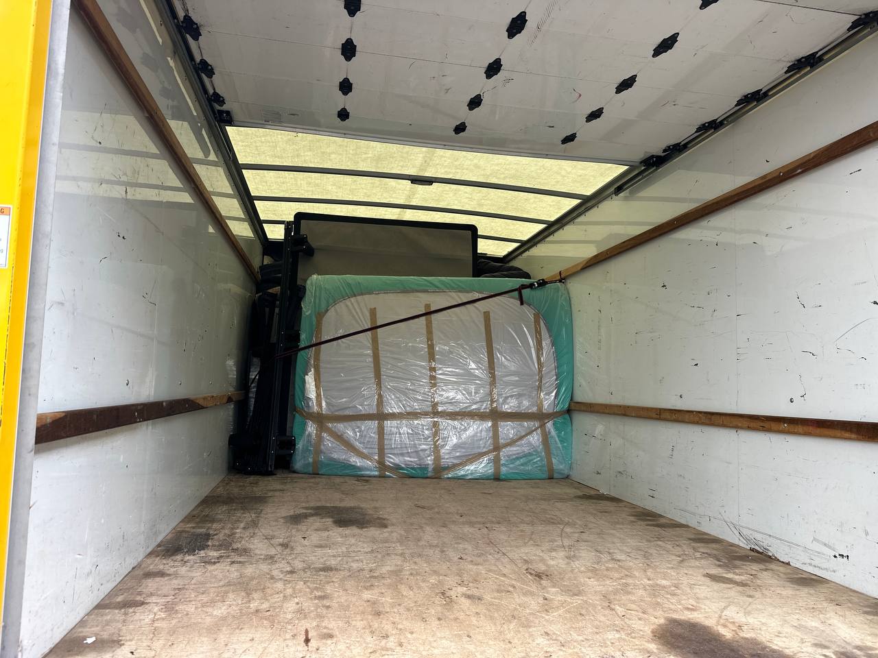 Household furniture and belongings being prepared for a residential move